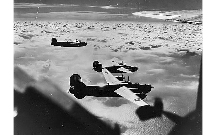 445th Bombardment Group B-24s, based at RAF Tibenham, England, head out for a mission over enemy territory on Oct. 6, 1944.