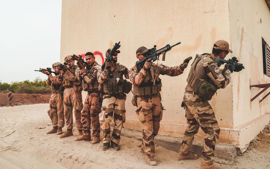 U.S. Marines and French soldiers conduct urban training during an exercise in Timbuktu, Mali, in 2021. France later pulled its troops out of Mali after the country moved closer to Russia and partnered with the Kremlin-backed Wagner Group.