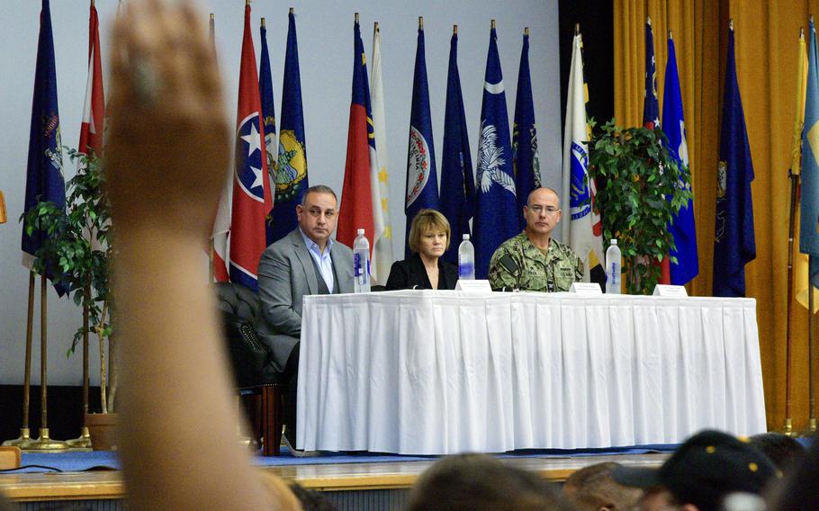 Gilbert Cisneros Jr., left, Undersecretary of Defense for Personnel and Preparedness.  Seilen Mullen, Center, Deputy Assistant Secretary of Defense for Health Affairs.  US Naval Medical Readiness Training Command Okinawa Commander Thomas Henrik Piner answers questions at the Town Hall in Camp Foster, Okinawa, Japan, Thursday, February 2, 2023.
