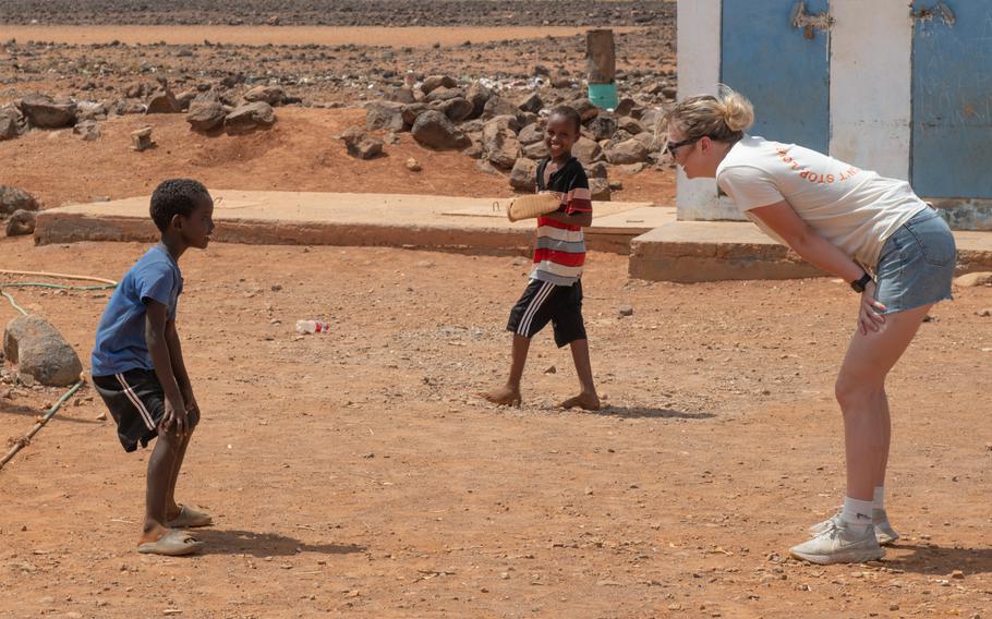 Volunteers played games and practiced English and French with children during the table delivery.