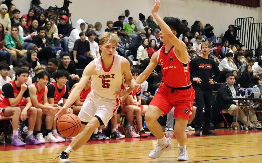 Gregory Tolar drives toward the basket.