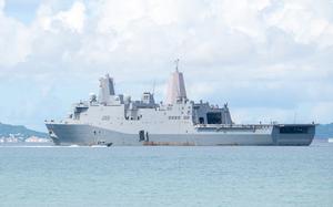 The fire-damaged USS New Orleans departs White Beach Naval Facility, Okinawa, Aug. 28, 2025.