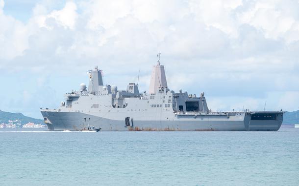 The fire-damaged USS New Orleans departs White Beach Naval Facility, Okinawa, Aug. 28, 2025.