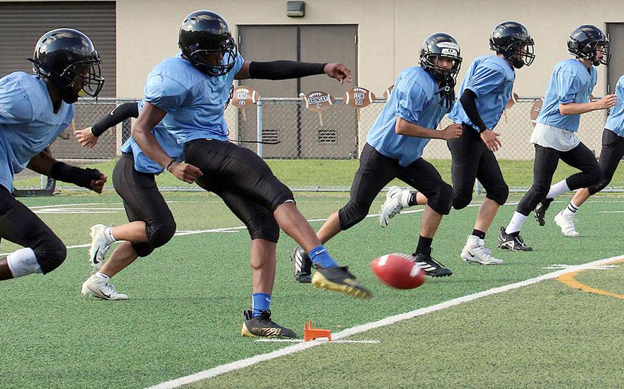 Jaylon Grant, kicking ball, is one of two starters and four players total from the 2019 Osan football team returning this season.