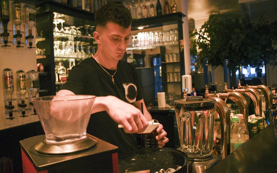 Good Vibes features a bar with Jamaican beers such as Red Stripe and Dragon Stout, as well as imported rums.