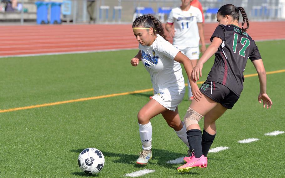 Sigonella’s Caro Charlize gets past AFNORTH’s Carla Chico in the Division III girls final at the DODEA-Europe soccer championships in Ramstein, Germany, May 22, 2025. AFNORTH won 4-2.