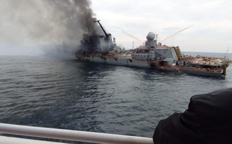 Images posted to social media April 18, 2022, appear to show the Russian missile cruiser Moskva damaged, on fire and leaning after taking on water. Stars and Stripes was unable to independently verify the origin of the images early Monday, but a range of military experts said the pictures appear legitimate.