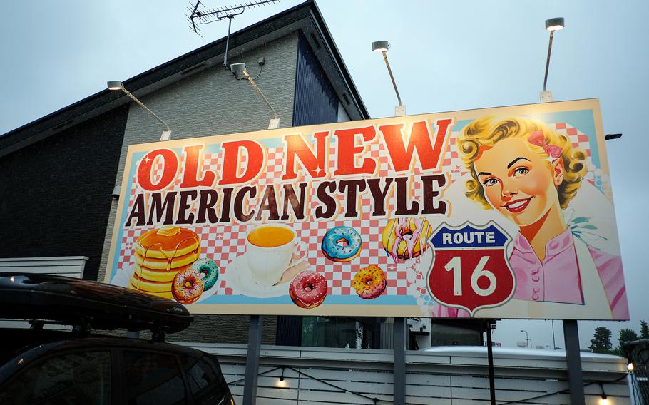 A billboard for Old New American Style has a midcentury Modern aesthetic.