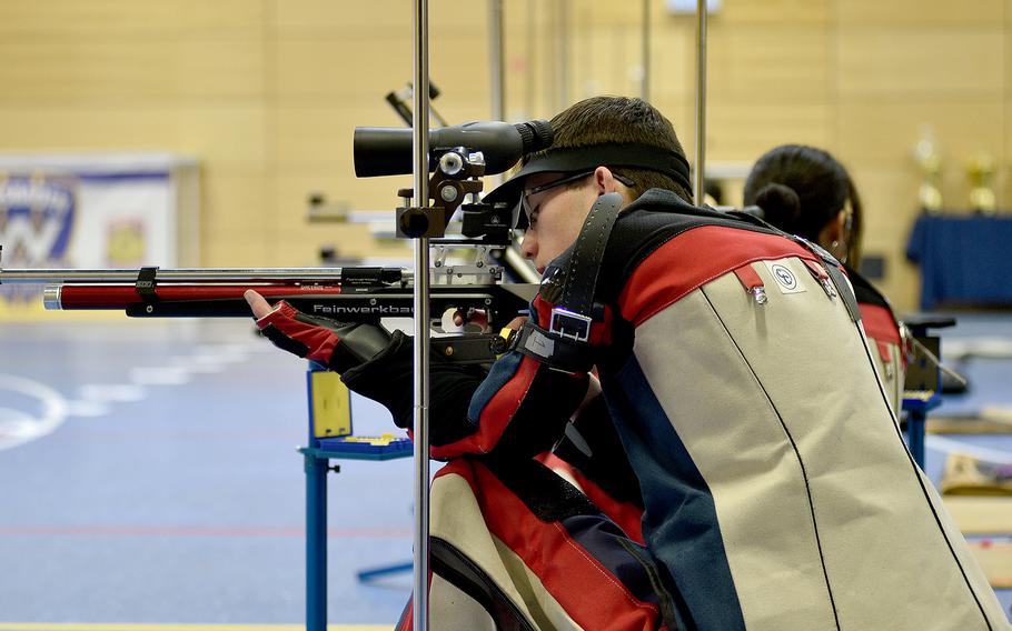Alconbury's Norman Snopkowski takes aim in the kneeling position during the DODEA European marksmanship championships Saturday at Wiesbaden High School in Wiesbaden, Germany.
