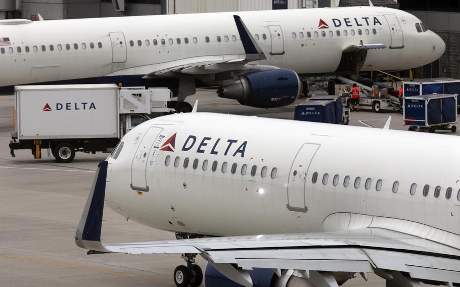 Delta Air Lines plane leaves the gate, Monday, July 12, 2021, at Logan International Airport in Boston.  Delta Air Lines has requested that the U.S. Department of Justice put any person convicted of a disruption on board a flight to the national “no fly” list. 
