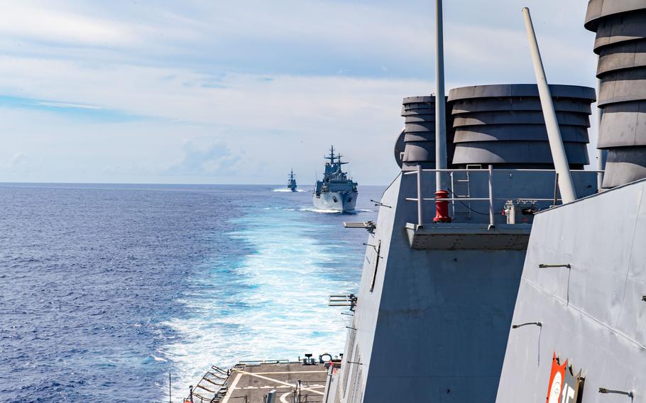 The Arleigh Burke-class guided-missile destroyer USS Milius conducts a trilateral training exercise with the Japan Maritime Self Defense Force Murusame-class destroyer JS Kirisame, the Australian navy supply-class auxiliary replenishment oiler HMAS Stalwart, and the Hobart-class air warfare destroyer HMAS Hobart while operating in the South China Sea, Oct. 7, 2023. A secret document from the National Geospatial-Intelligence Agency, which has not previously been reported, shows the Chinese military is making technological advances that could help it target American warships around Taiwan and military bases in the region.