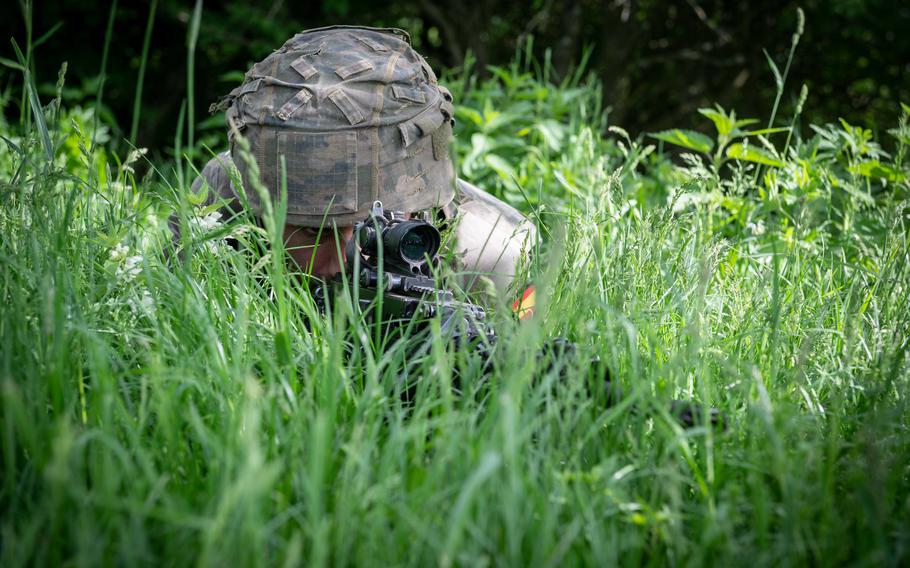 A Spanish soldier holds a position near Cincu, Romania, during exercise Steadfast Defender, May 24, 2021. NATO will launch another iteration of the exercise in 2024, one that is expected to be the largest post-Cold War military drill to date.