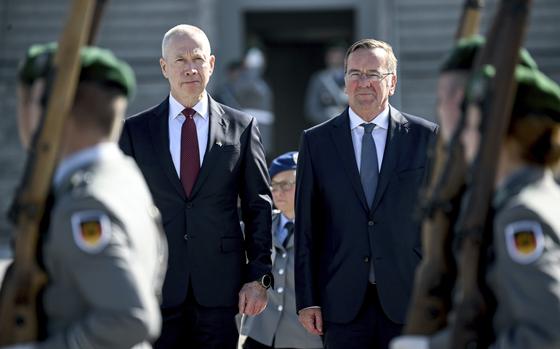 German Federal Minister of Defense Boris Pistorius, right, receives his Israeli counterpart Joav Galant with military honors in Berlin, Germany, Thursday Sept. 28. 2023. Israel and Germany have signed an agreement on the purchase of the Israeli Arrow 3 missile defense system by Berlin. (Britta Pedersen/dpa via AP)