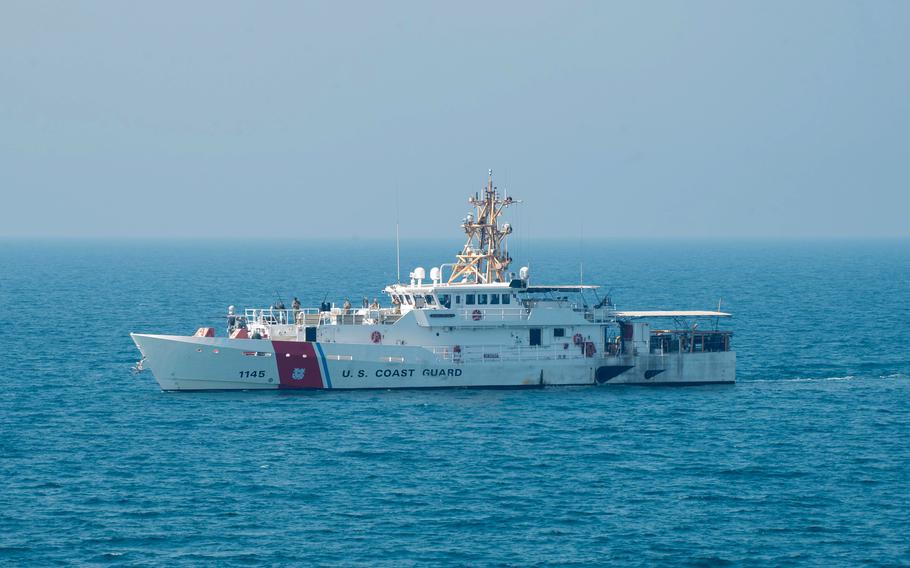 A U.S. Coast Guard fast response cutter transits in water.