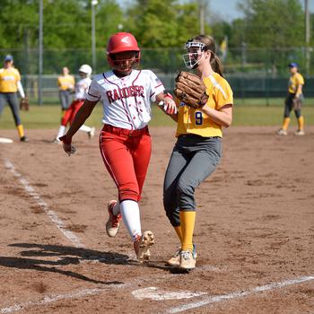 Laylah Cole scores after a passed ball.