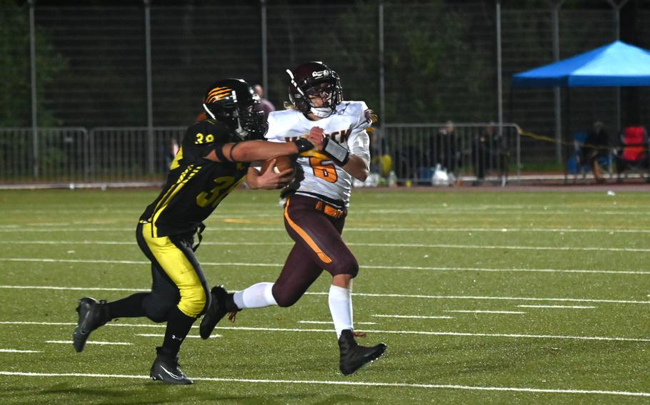 Vilseck’s backup QB sophomore Parker Wayland breaks off a run for a short gain against the Panthers defense during the DODEA Europe Division I championship game against Stuttgart on Oct. 28, 2023, at Stuttgart High School.