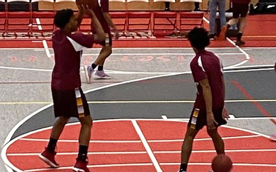 Baumholder freshman Caleb Pigge takes a jump shot during a warmups before a recent game.