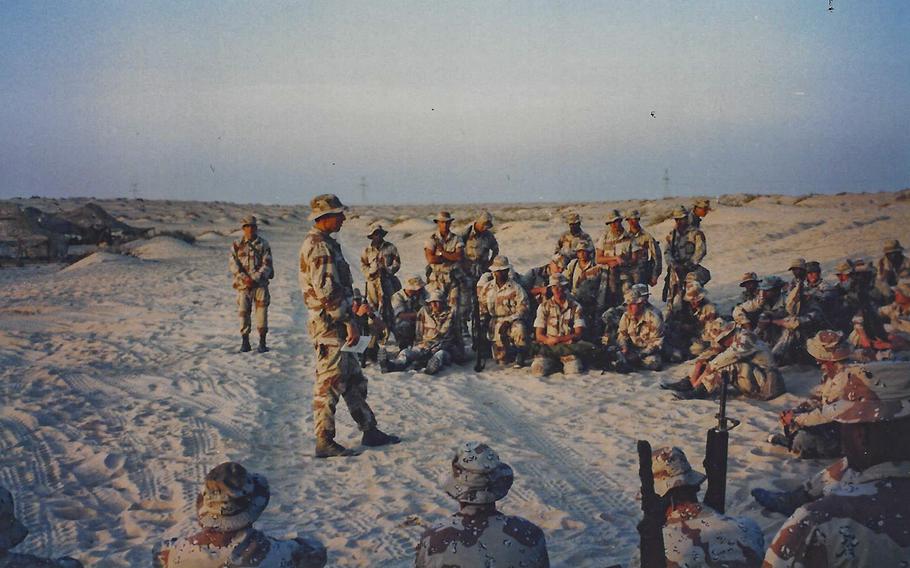 Retired U.S. Marine Lt. Col. John Carretti, center, instructs training classes during Operation Desert Storm at an undisclosed location on Jan. 1, 1991.