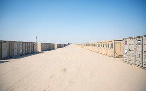 Storage containers for Army tent cities are shown at an undisclosed location. A recent Defense Department Inspector General audit found that the Army and its contractors failed to adequately manage the modules stored in the U.S. Central Command area. 