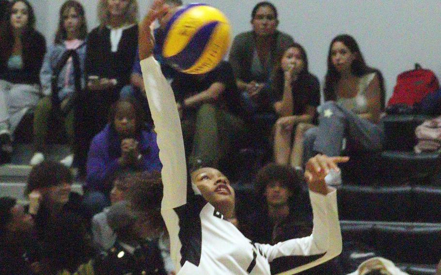 Humphreys' Anaya Reyes strikes the ball against Yongsan International School of Seoul during Wednesday's Korea girls volleyball match. The Guardians won in four sets.