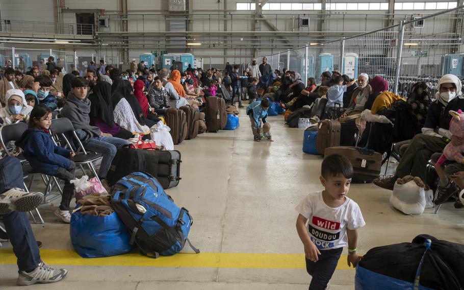 Afghan evacuees await transportation to the United States at Ramstein Air Base, Germany, on Aug. 30, 2021.