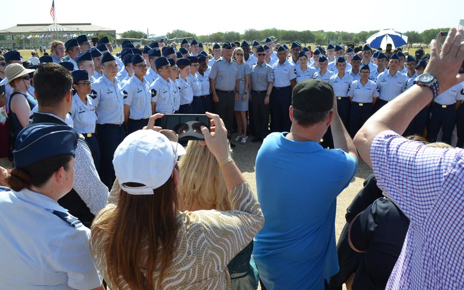 Gen. John Raymond, chief of space operations, and his wife Mollie Raymond pose with Space Force basic training graduates Thursday, June 23, 2022, at Joint Base San Antonio-Lackland Air Force Base in Texas.