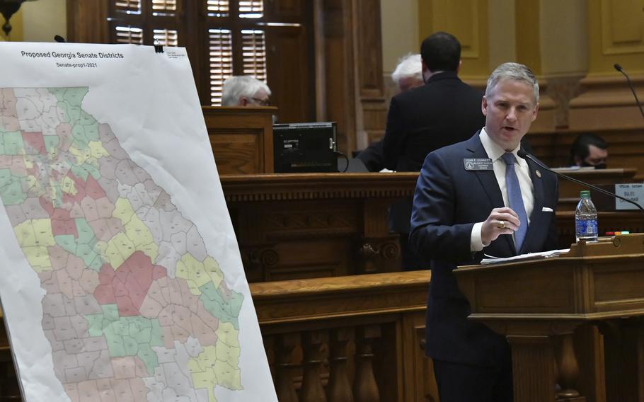 Sen. John Kennedy introduces SB 1 EX in the Senate Chambers during a special session at the Georgia State Capitol in Atlanta on Tuesday, Nov. 9, 2021. The hearing was a step toward votes on new political maps for the state House, state Senate and Congress.
