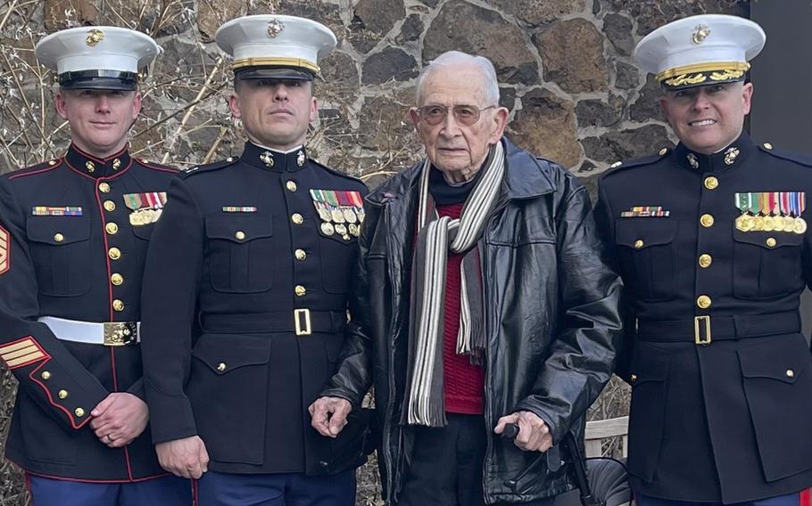 U.S. Marines attend the 100th birthday celebration for World War II Marine veteran Donn Thompson in Spokane, Washington on Feb. 24, 2023. 