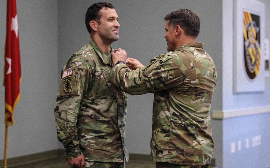 Sgt. Ian Tyrrel receives the Soldier’s Medal for heroism, July 14, 2021, at Fort Campbell, Ky. Tyrrel was awarded the medal for saving an injured woman from drowning, on what was supposed to be a relaxing kayak trip on Tennessee’s Red River.