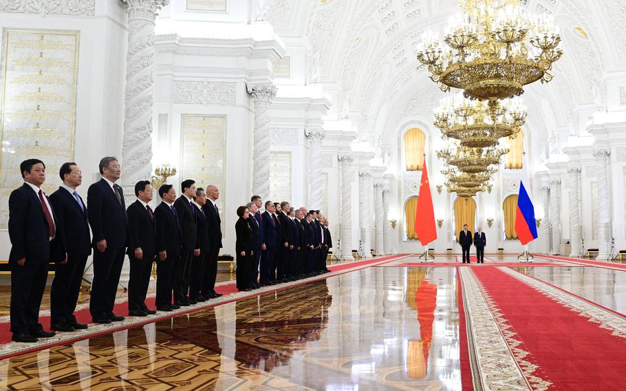 Russian President Vladimir Putin meets with China’s President Xi Jinping at the Kremlin in Moscow on Tuesday, March 21, 2023. 