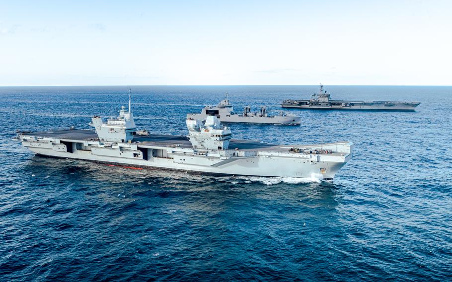 The British aircraft carrier Prince of Wales sails with USS George Washington and French logistics supply ship Jacques Chevallier in the Atlantic Ocean in November 2023. Britain will have 20,000 in this year's exercise Steadfast Defender, NATO’s largest combat drill since the Cold War, according to the country's defense minister.