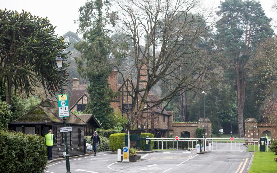 Security barriers sit closed outside the St George's Hill private estate in Weybridge, Surrey, U.K. on April 11, 2018. MUST CREDIT: Bloomberg photo by Jason Alden.