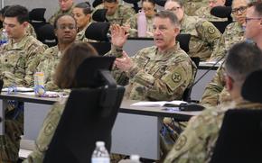 Col. Christopher Hunter, deputy commander, 364th Expeditionary Sustainment Command, briefs Soldiers as they embark on their culminating training exercise in February 2024 at Fort Knox, Kentucky. The 364th ESC will staff the 1st Theater Sustainment Command's forward operational command post in Kuwait.