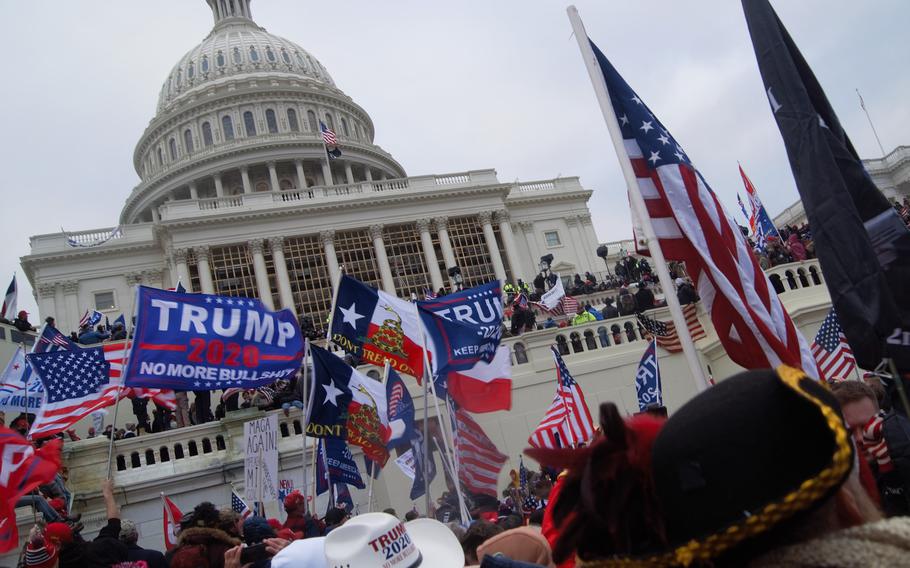 A former military police officer from Texas — who excitedly planned for physical violence at the U.S. Capitol on Jan. 6, 2021, engaged in hand-to-hand battle with police there for nearly 90 minutes, then lied about being in Washington when questioned by the FBI — was sentenced Wednesday to slightly more than four years in prison.