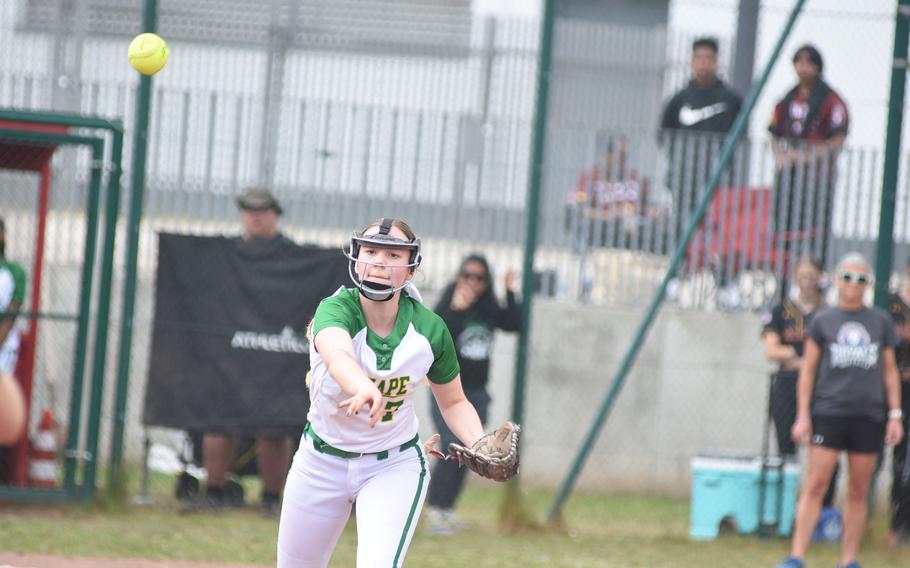 SHAPE pitcher Paula Knapp throws to first after fielding a ground ball Wednesday, May 21, 2025, on the opening day of the DODEA-Europe Division I softball championshiips at Kaiserslautern, Gerrmany.