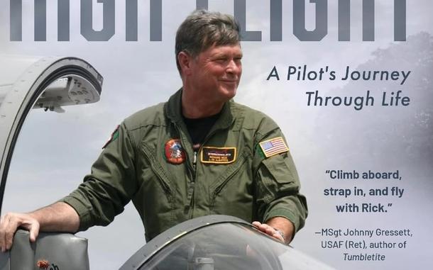 A book cover features the author wearing a flightsuit and standing in front of a fighter jet.