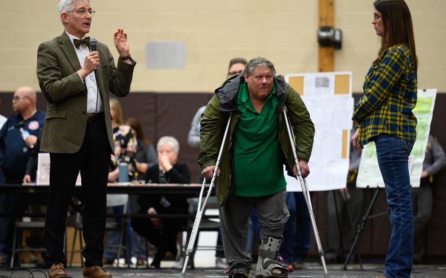 Bruce Vanderhoffin, who is the director of the Ohio Department of Health, answers questions posed by community members at the town hall meeting in East Palestine.