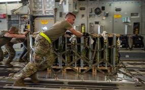Team Dover Airmen load pallets of ammunition onto a C-17 Globemaster III bound for Ukraine during a security assistance mission at Dover Air Force Base, Delaware, Aug. 9, 2022. The Department of Defense is providing Ukraine with critical capabilities to defend against Russian aggression under the Ukraine Security Assistance Initiative. Since 2014, the United States has committed more than $11.8 billion in security assistance to Ukraine.  (U.S. Air Force photo by Airman 1st Class Cydney Lee)