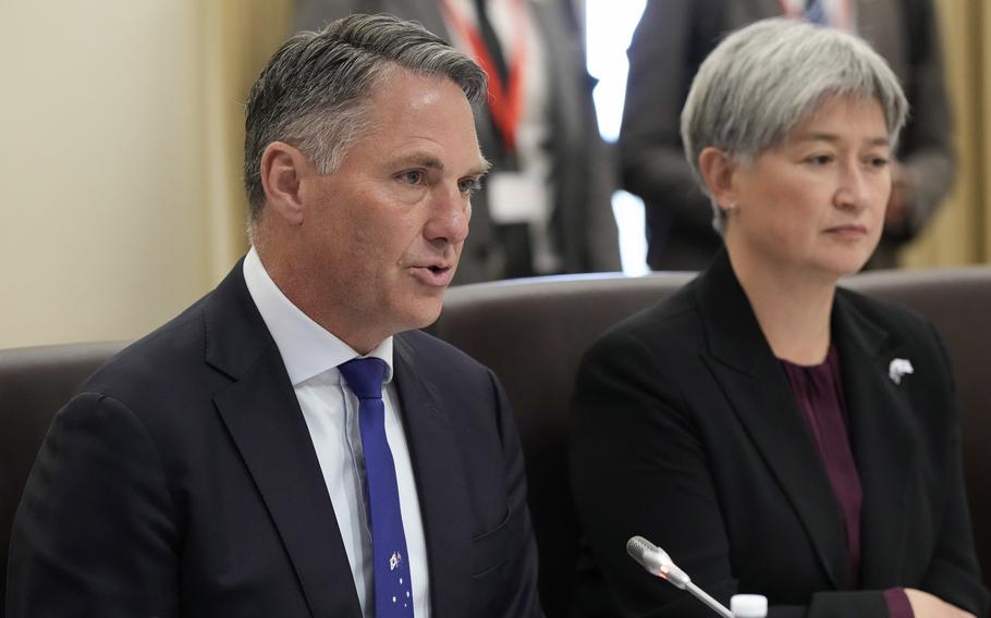 Australian Deputy Prime Minister and Minister of Defense Richard Marles, left, speaks with Australian Foreign Minister Penny Wong during a meeting of the Australian and South Korean Ministers of Foreign Affairs and Defense in Melbourne, Australia, on May 1, 2024 . 