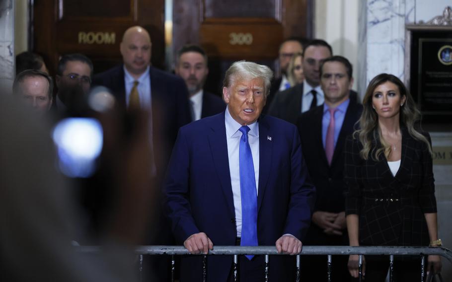 Former President Donald Trump speaks to members of the media after testifying at his civil fraud trial at New York State Supreme Court on Monday, Nov. 6, 2023, in New York City.