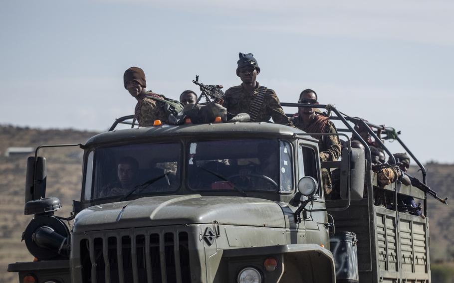 Ethiopian government soldiers ride in the back of a truck on a road near Agula, north of Mekele, in the Tigray region of northern Ethiopia on May 8, 2021. Authorities in Ethiopia’s northern Tigray region alleged Wednesday, Aug. 24, 2022 that Ethiopia’s military launched a “large-scale” offensive for the first time in a year, while Ethiopia’s military spokesman did not immediately respond to questions. 