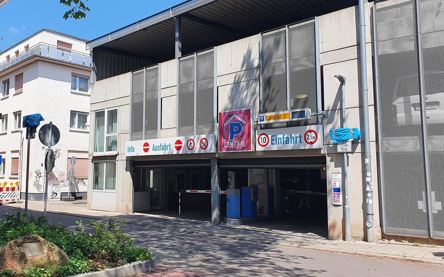 German police on July 22, 2021, released security camera footage from December of a man pulling a shopping cart with a large object wrapped in white past this downtown Kaiserslautern parking garage on Rosenstrasse.The man is a suspect in the killing of Diana Bodi, who was found dead in an alley near the garage, in December last year.