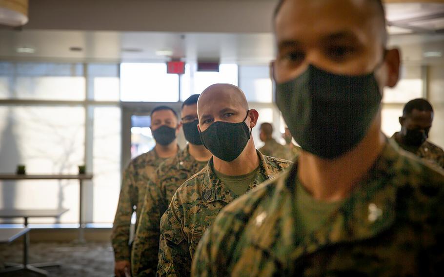 Marines line up for coronavirus vaccines at Camp Pendleton, Calif., in January. 