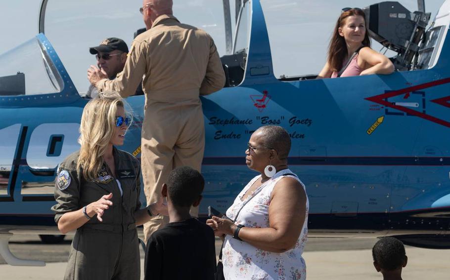 Stephanie Boss Goetz, left, talks with Edra Wright of Sacramento about the Organization of Black Aerospace Professionals at the California Capital Airshow on Sept. 24, 2023, at Mather Airport.