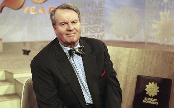 FILE - Charles Osgood, anchor of CBS's "Sunday Morning," poses for a portrait on the set in New York on March 28, 1999.  Osgood, who anchored the popular news magazine's for more than two decades, was host of the long-running radio program “The Osgood File” and was referred to as CBS News’ poet-in-residence, has died. He was 91. (AP Photo/Suzanne Plunkett, File)