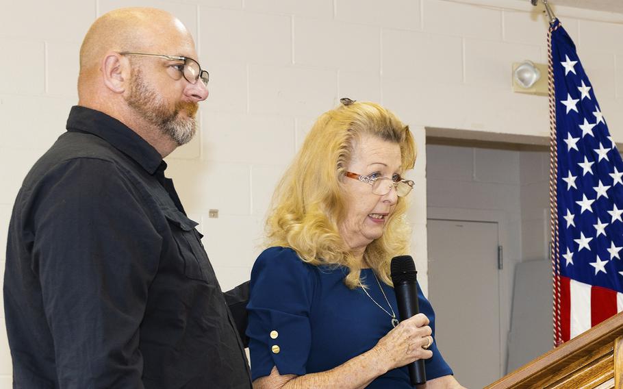 Carl Hughes, the son of Vietnam veteran Marine Cpl. Larry A. Hughes, and Patricia Prickett, Cpl. Hughes’ sister, speak during a presentation ceremony in Inglis, Florida, on Feb. 17, 2023. Cpl. Hughes’ dog tag was recovered during a battlefield study tour at the An Hoa airstrip in Vietnam and returned to the Hughes’ family.