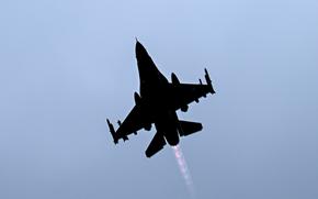 An American F-16 Fighting Falcon flies over England on April 15, 2025. The U.S. State Department approved a $310.5 million sale to Ukraine for training and equipment related to its fleet of F-16 jets.