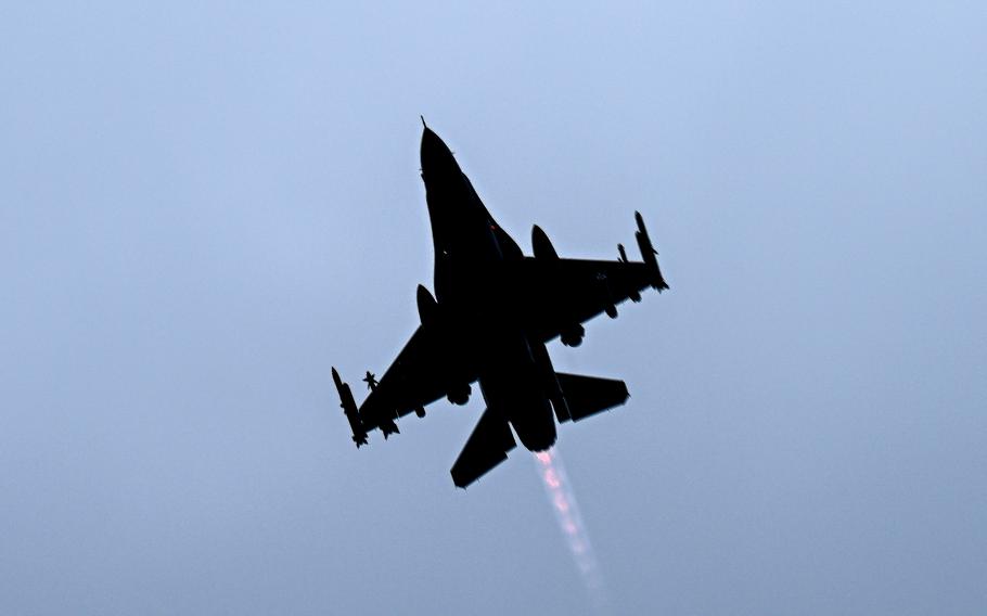 An F-16 Fighting Falcon flies over England. 