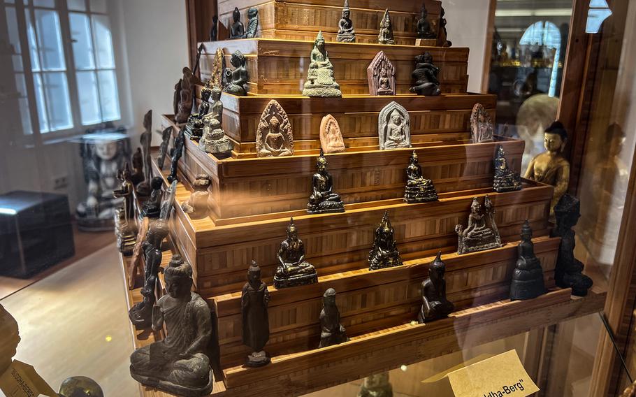 The small "Buddha Berg" displays tiny carvings of the Buddha at the Buddha Museum in Traben-Trarbach, Germany, June 11, 2022. Displays in the museums miniature collection feature hundreds of tiny Buddhas from religious sites in Thailand, Laos, Burma and elsewhere, the oldest of which is more than 750 years old.