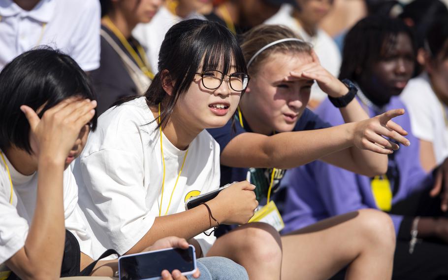 Elizabeth Shoop explains the rules of American football to Nagi Takemoto during the Student Educational Exchange and Dialogue camp at Matthew C. Perry High School, Marine Corps Air Station Iwakuni, Japan, Sept. 23, 2023. 